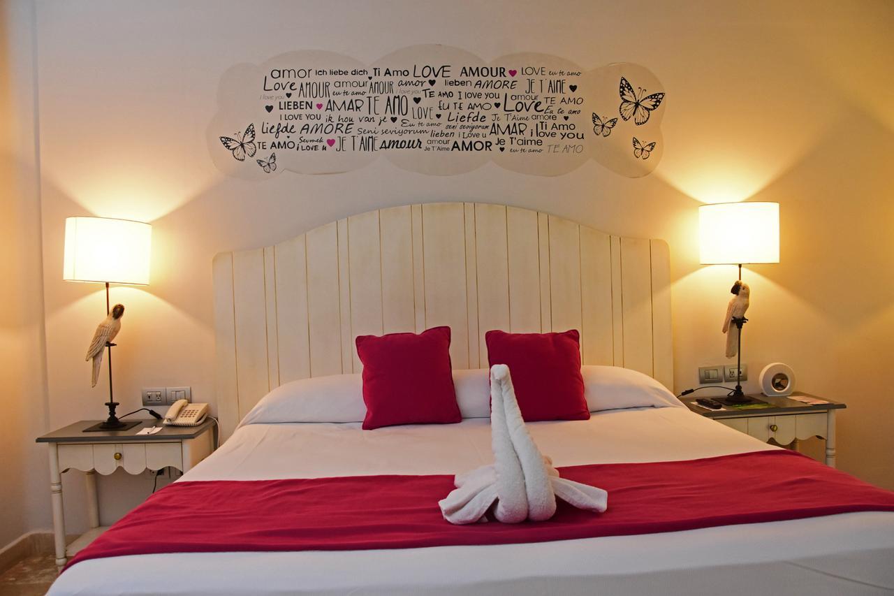 Catalonia Riviera Maya Resort & Spa Puerto Aventuras Exteriér fotografie A bedroom at the hotel